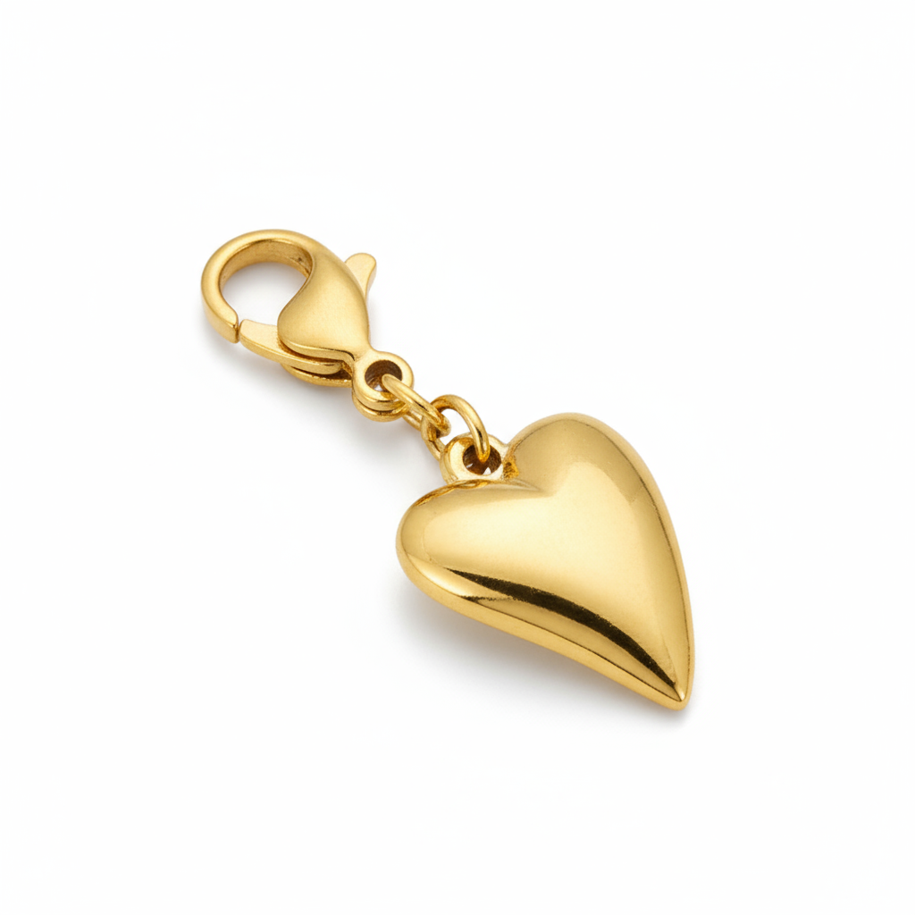 Charms Vanytel corazón alargado, dorado en acero inoxidable, ideales para pulseras o cadenas personalizadas.