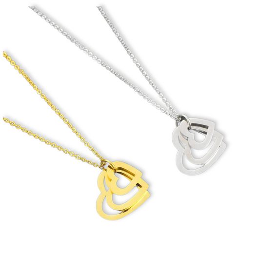 Collar Mis Amores Vanytel con 2 dijes de corazón en acero inoxidable, disponible en dorado o plateado.