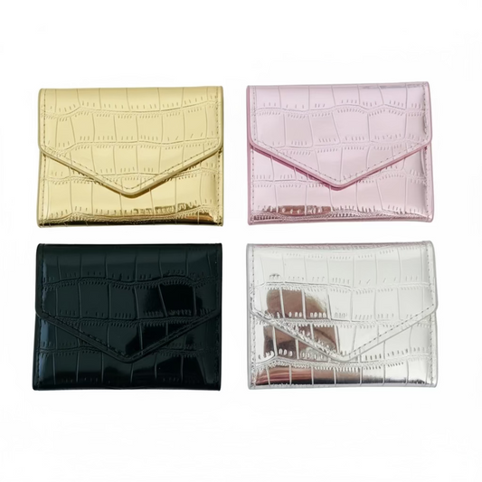 Colección de monederos metálicos en varios colores, Vanytel Jewelry & Shop.
